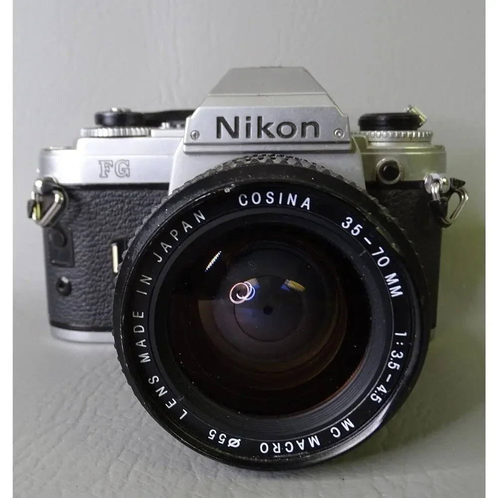 Nikon FG SLR Film Camera Chrome w/ Cosina 35-70 mm f3.5-4.5 MC Macro Lens